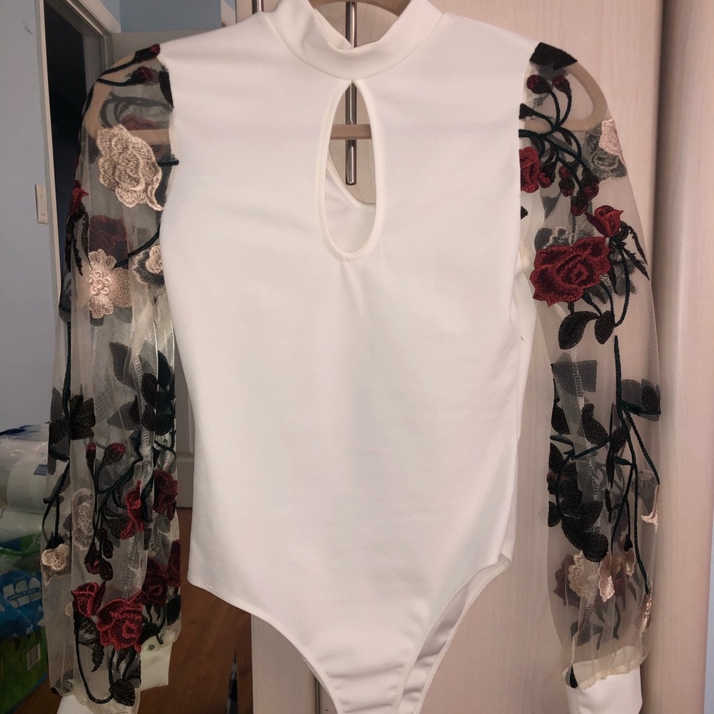 Fashion Nova white with floral sleeves body suit